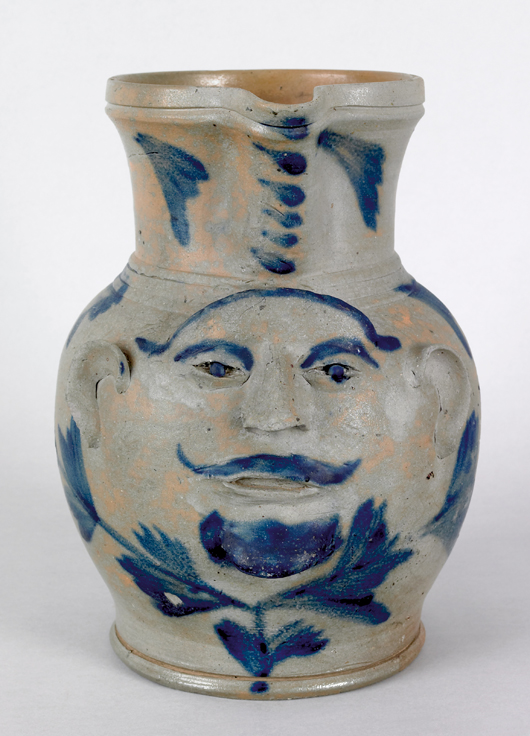 Rare and whimsical, a Philadelphia stoneware face pitcher accented with cobalt sold for $81,900 in October 2008. Courtesy Pook & Pook.